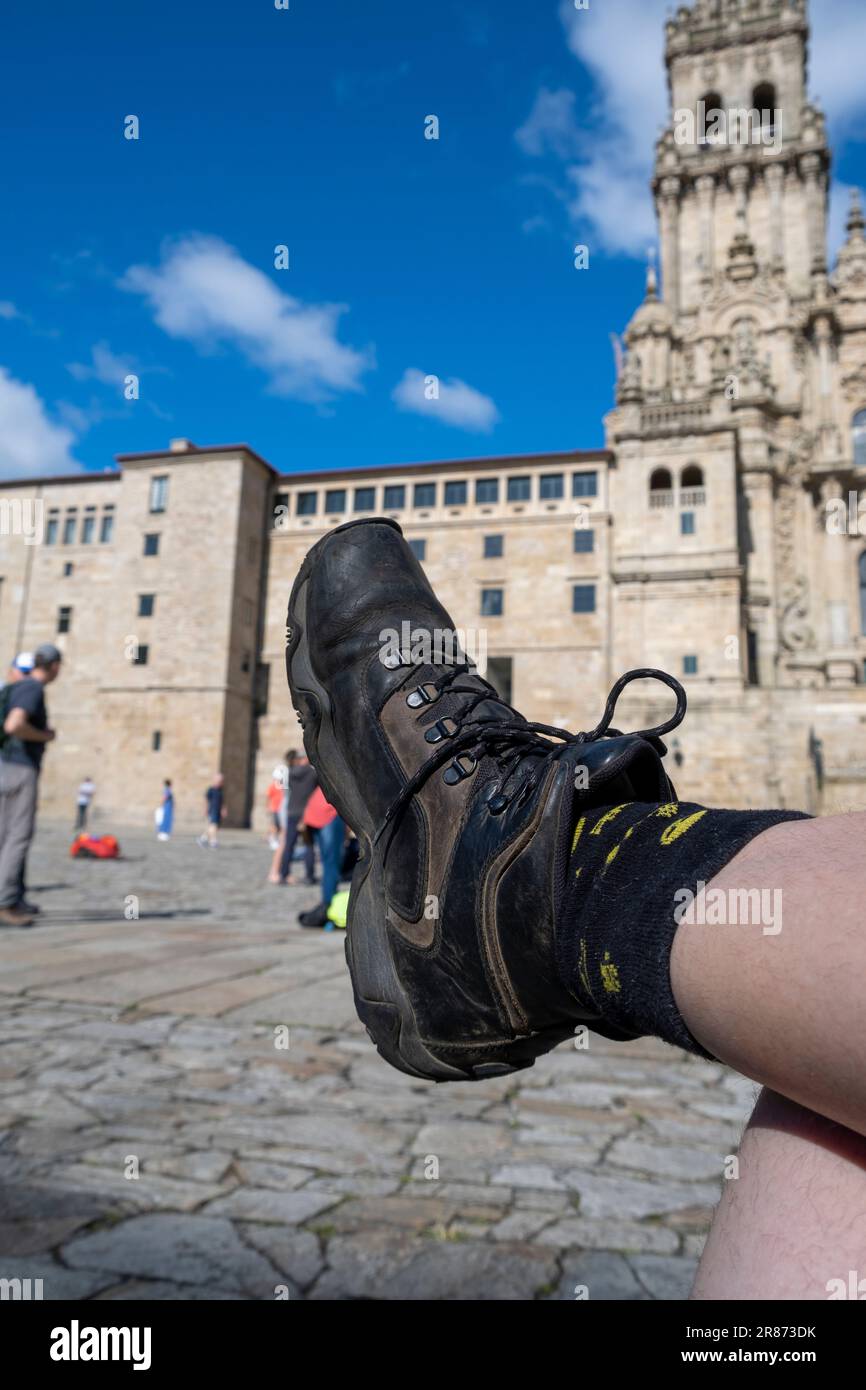 Boots in front the Cathedral of Santiago de Compostela, La Coruna, Galicia, Spain. Celebration and achievement concept Stock Photo