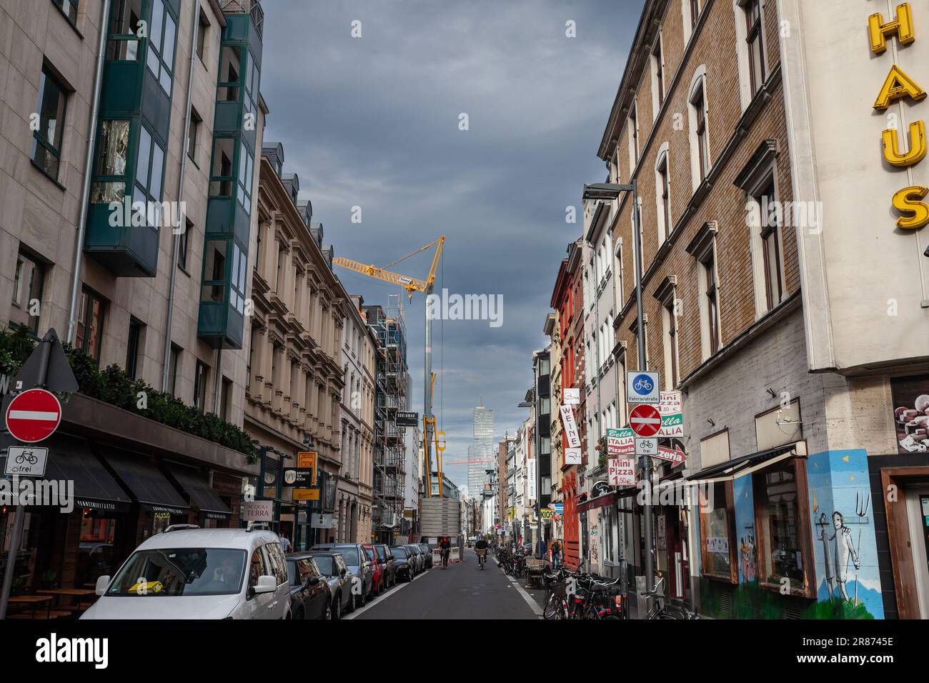 Picture of a street of Cologne, Germany, with residential buildings in the city center. Cologne