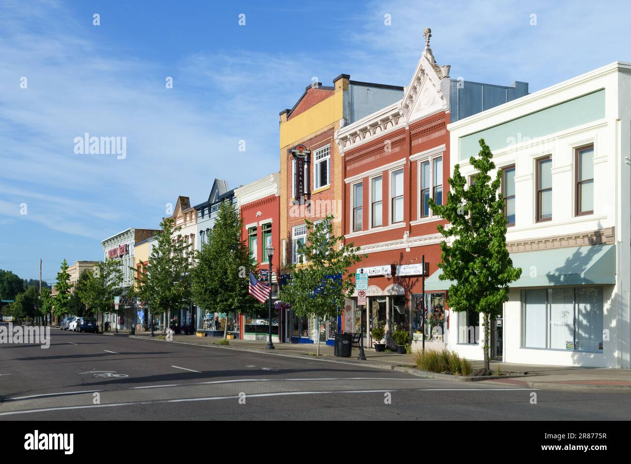 Dallas, OR, USA - June 13, 2023; Row of colorful shops in downtown ...