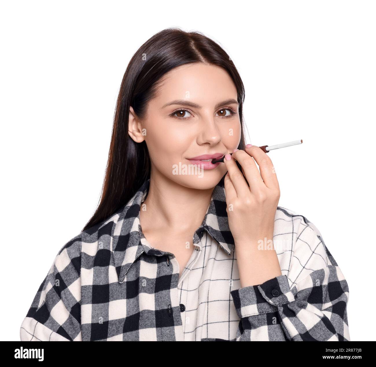 Woman using cigarette holder for smoking isolated on white Stock Photo