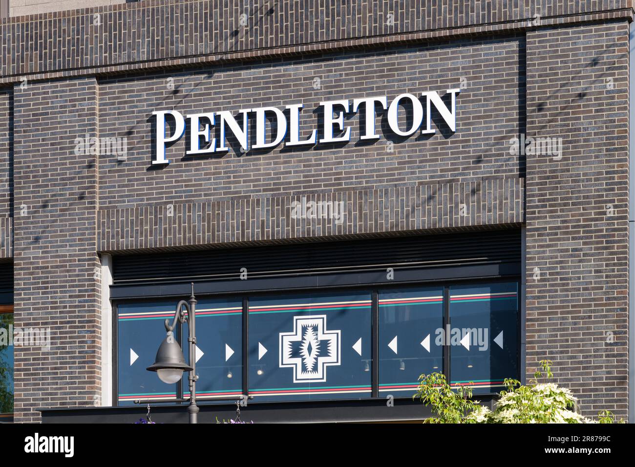 Kirkland, WA, USA - June 04, 2023; Pendleton Woolen Mills store sign on facade of shop with brand logo and brickwork Stock Photo