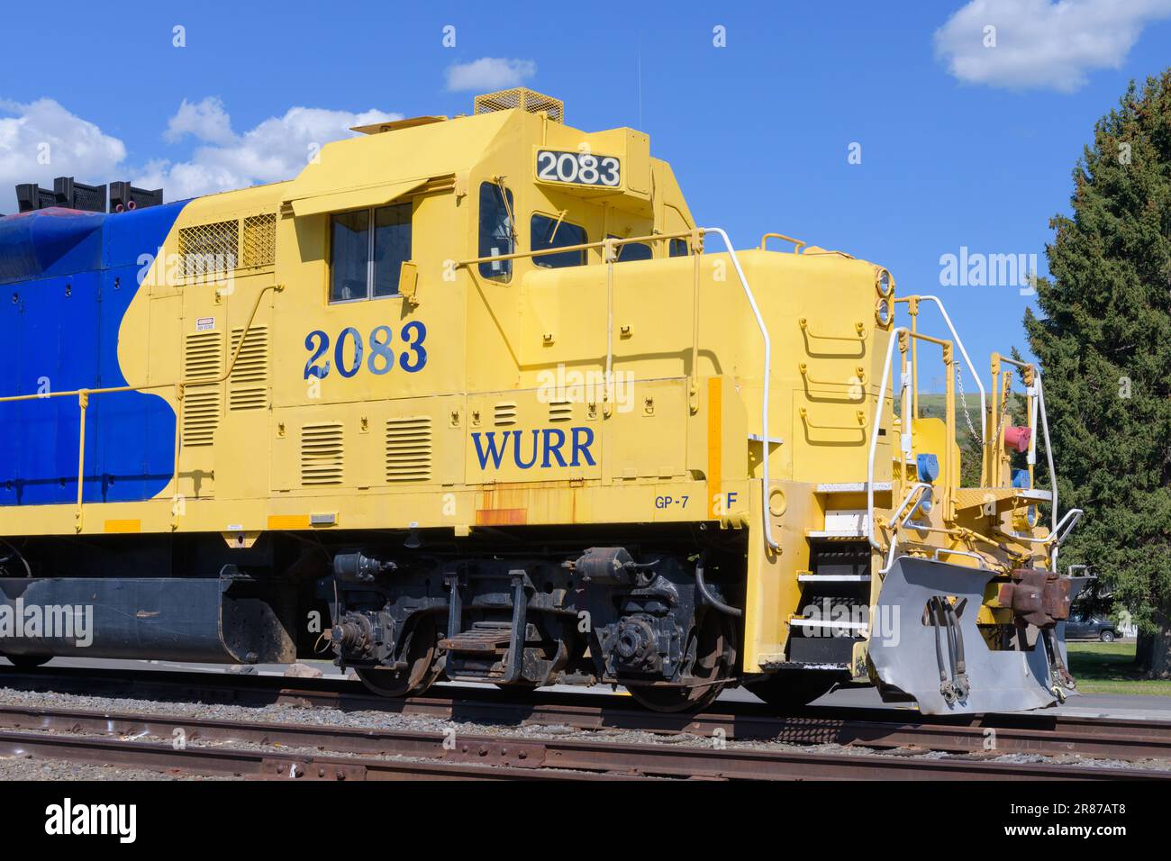 Elgin, OR, USA - May 24, 2023; Blue and yellow locomotive cab of Wallowa Union Railroad locomotive in Elgin Oregon Stock Photo