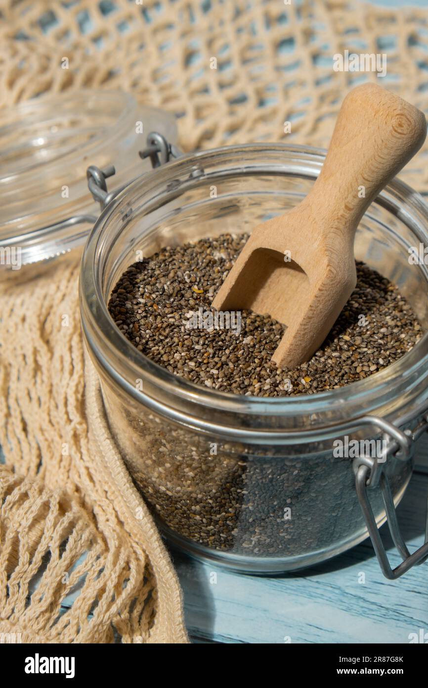 Chia seeds in glass jar. Healthy superfood rich in Omega 3 fatty acids