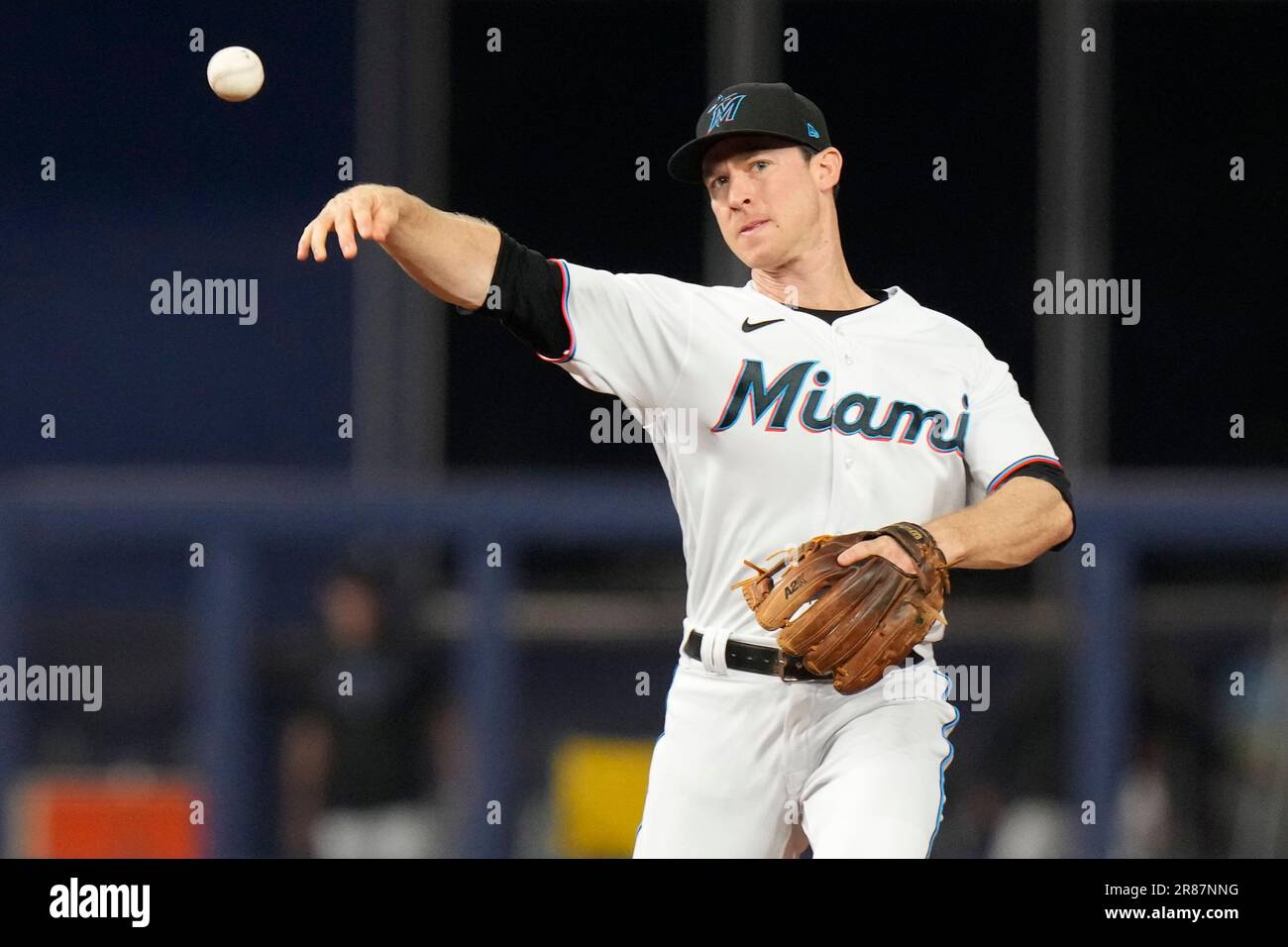 Joey Wendle of the Miami Marlins throws to first base for an out