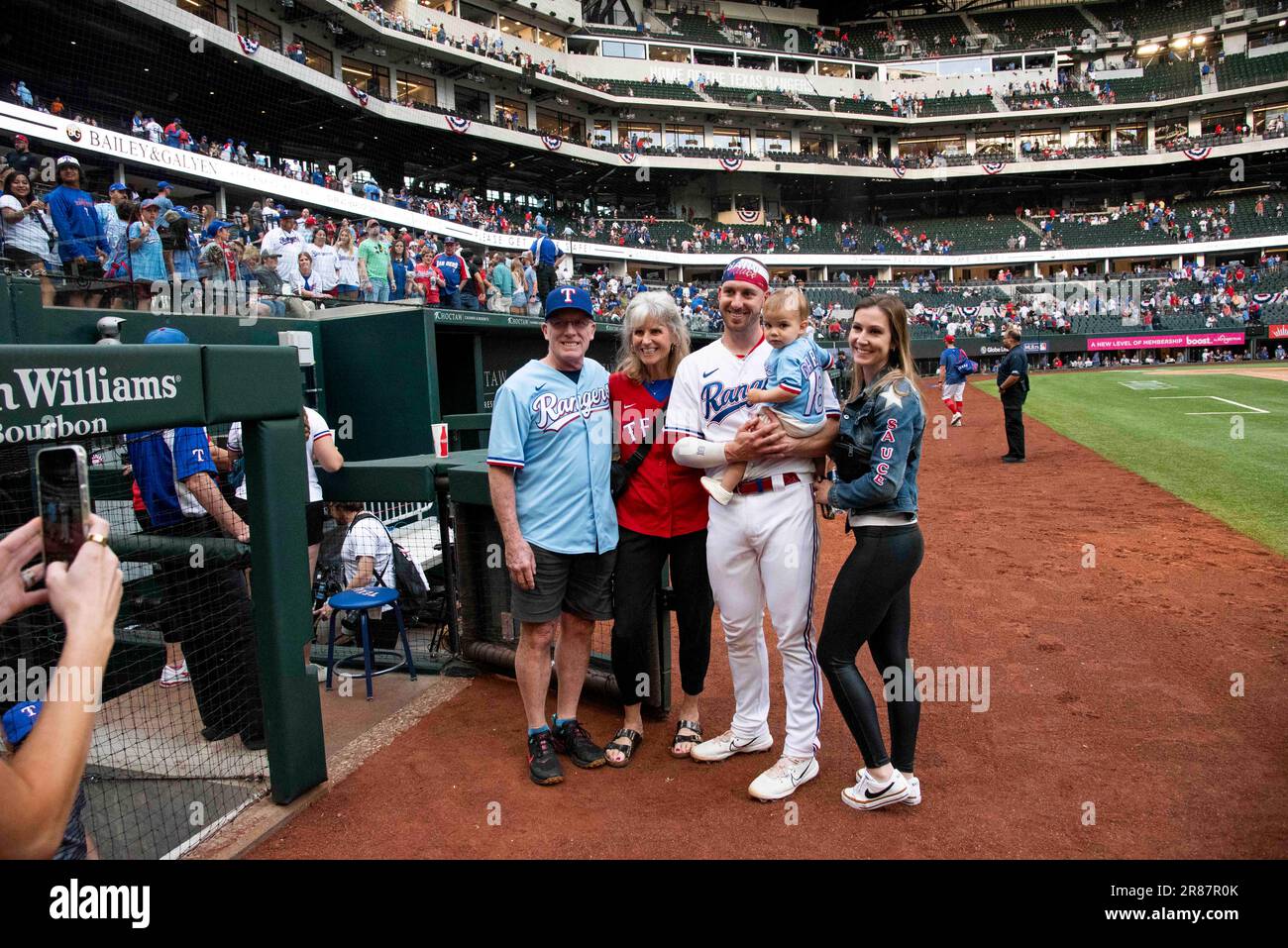 Texas Rangers catcher Mitch Garver (18) poses for a photo with