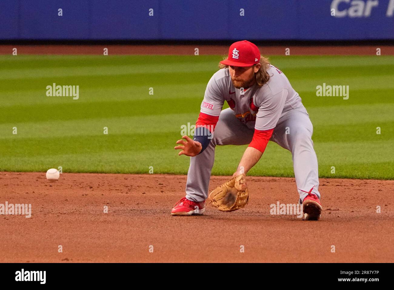 FLUSHING, NY - JUNE 16: St. Louis Cardinals Second Baseman Brendan Donovan  (33) fields a ground ball hit by New York Mets First Baseman Mark Canha  (19) (not pictured) during the second