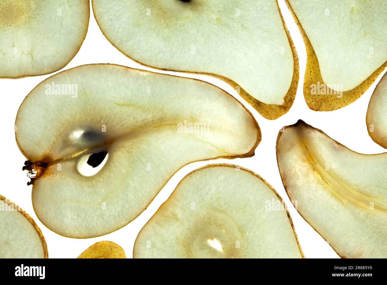 Sliced pear against white background Studio shot Stock Photo