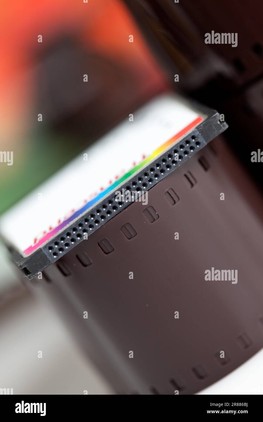 Old camera film strip with photo background Stock Photo - Alamy