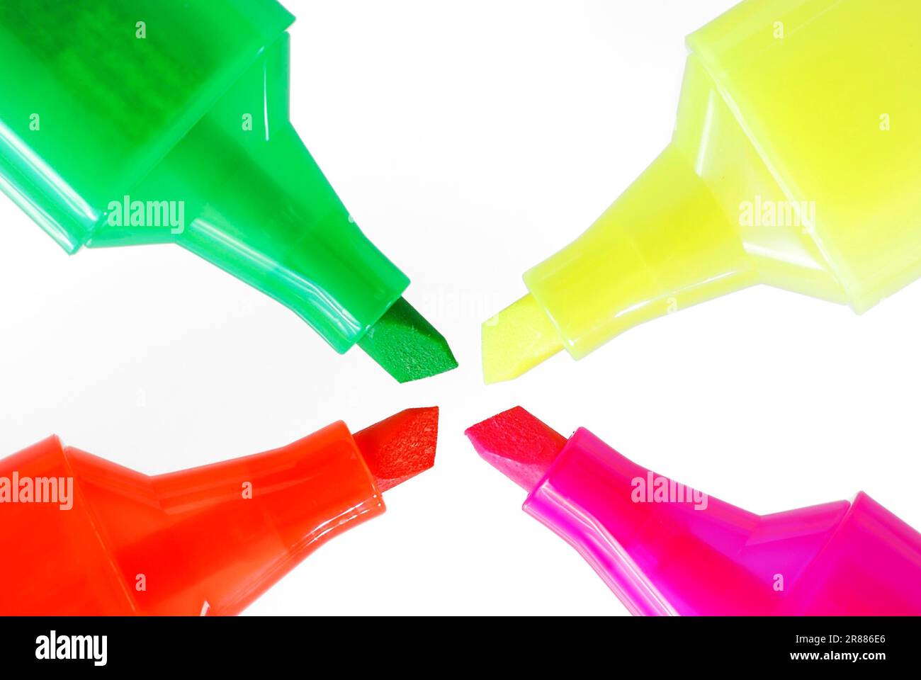 Four fluorescent highlighters with different colours Stock Photo