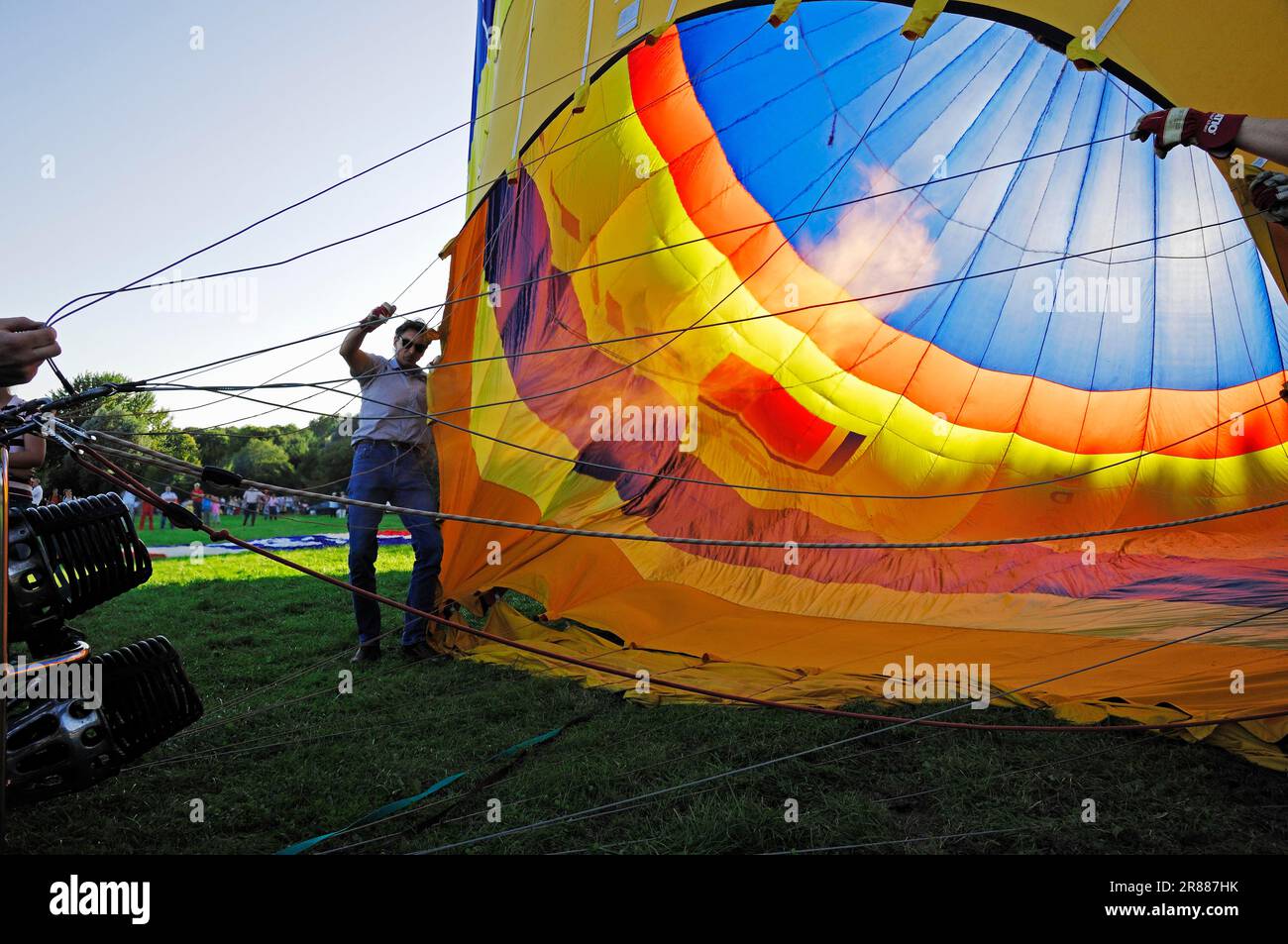 Hot air balloon being inflated, Montgolfiade, Muenster, North Rhine-Westphalia, Germany Stock Photo