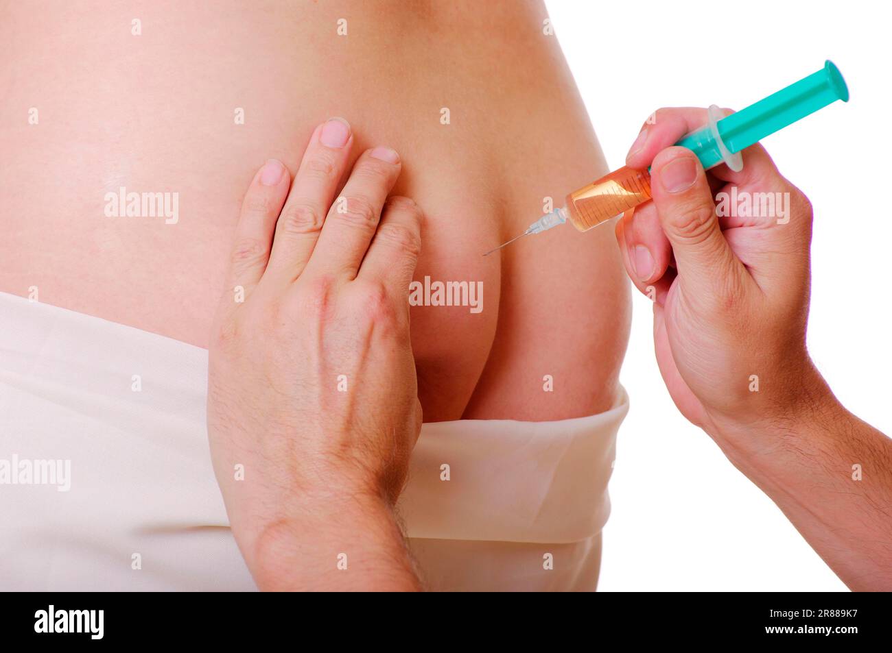 Download this stock image: Injection into buttocks, syringe, injection syri...