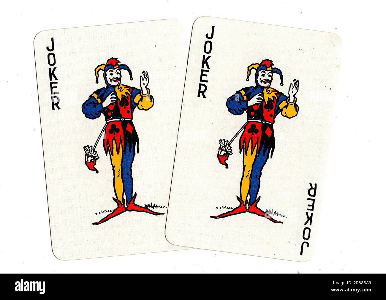 A pair of vintage playing cards featuring jokers on a white background Stock Photo Alamy