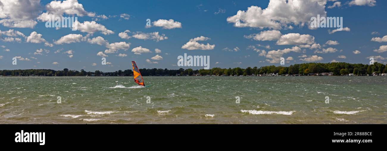 Middleville, Michigan, A windsurfer on a windy day on Gun Lake in