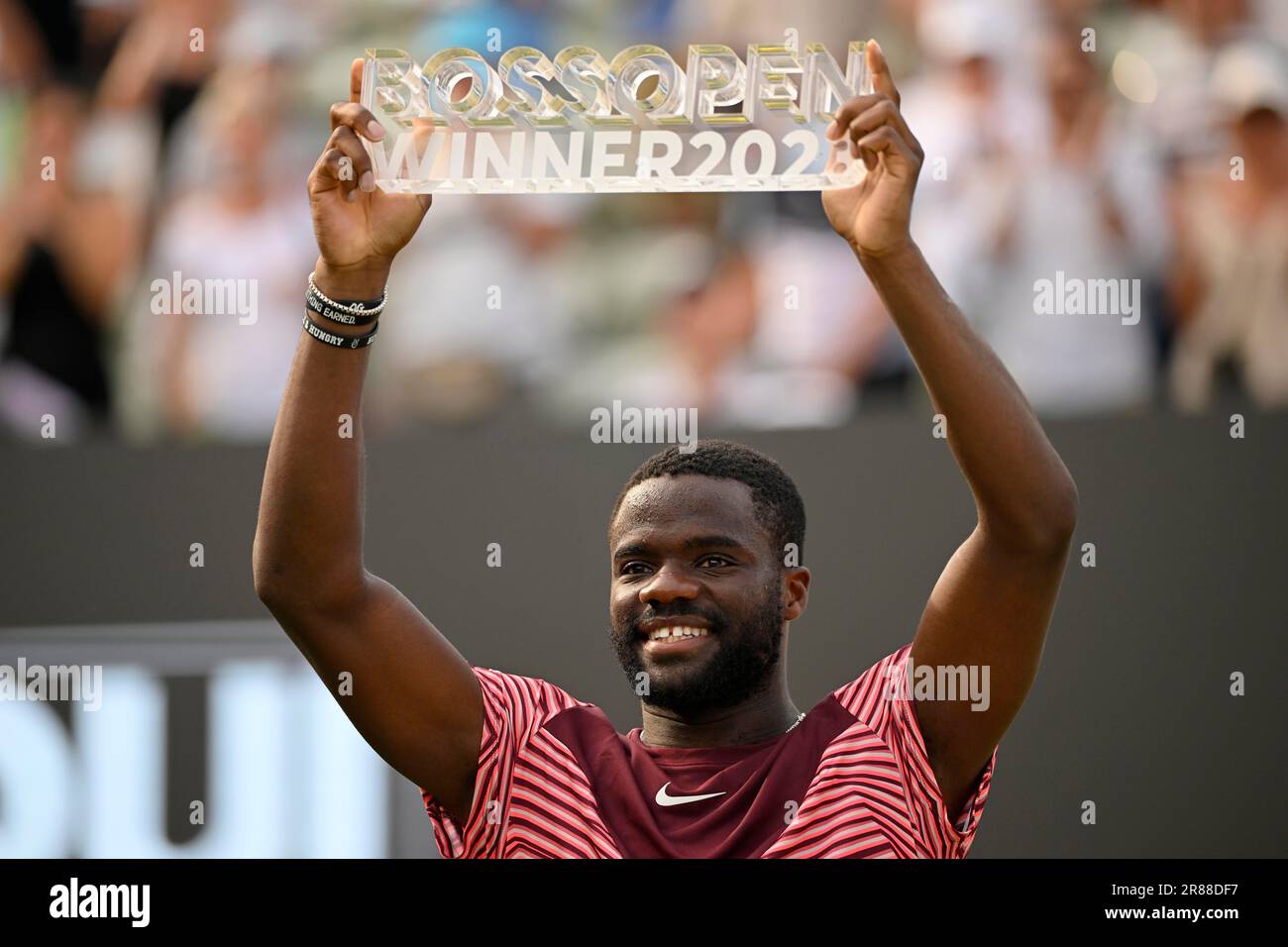 Award ceremony, Frances Tiafoe USA holds winner's trophy, tennis, BOSS