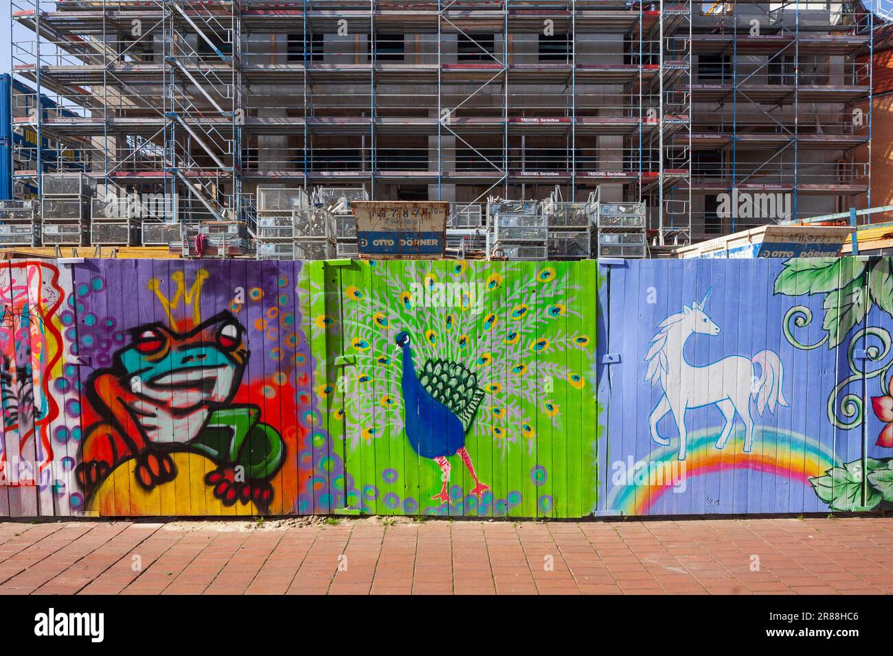 Shell construction, building site, commercial building, colourfully painted construction fence, Harburg city centre, Harburg, Hamburg, Germany Stock Photo