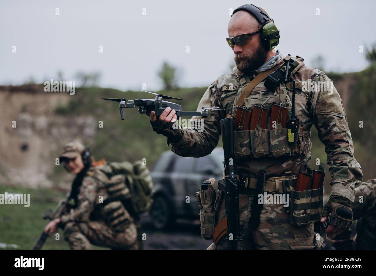 Two Ukrainian soldiers practicing with a drone Stock Photo - Alamy
