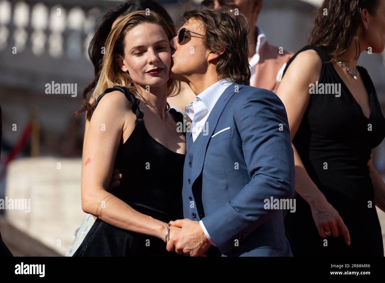 Tom Cruise kisses Rebecca Ferguson during the Red Carpet at the Global Premiere of Paramount