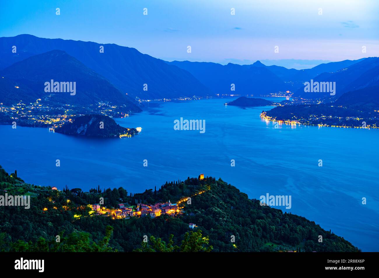 Lake Como, Photographed from Perledo, showing Varenna, Bellagio, Castello di Vezio, and Punta Balbianello, on a spring day. Stock Photo