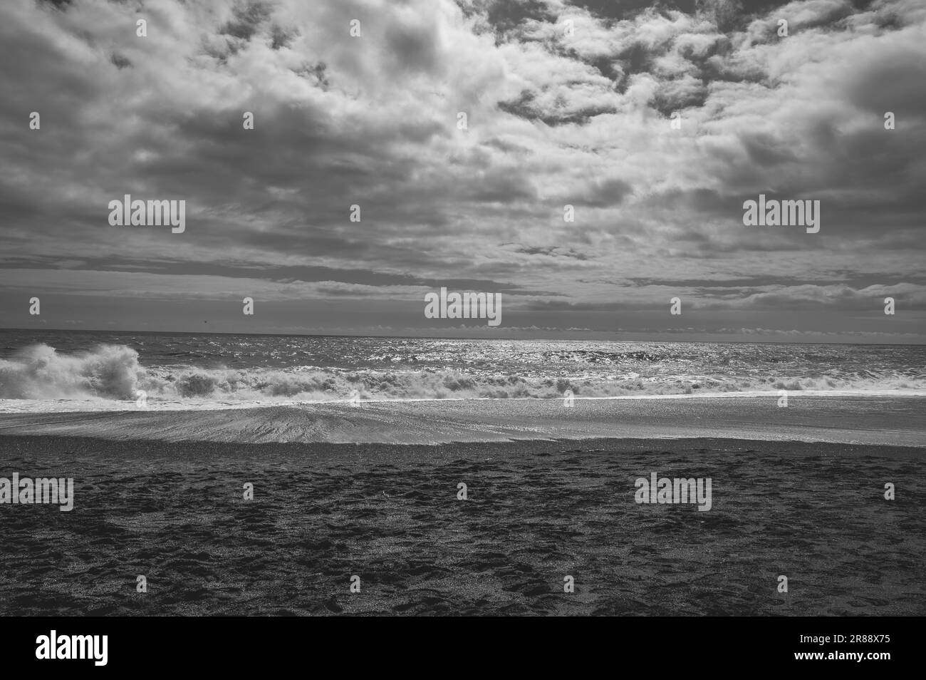 Dangerous black sand beach, Iceland Stock Photo - Alamy