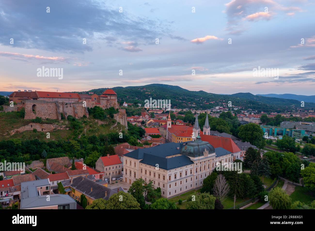 Aerial skyline view about the Archdiocese Office and Castle of Esztergom in the historic quarter, embraced by the Basilica and the Danube. Stock Photo