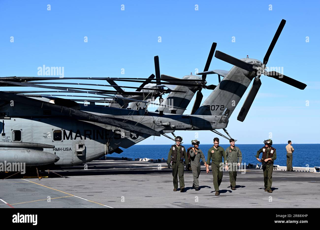 Brisbane, Australia. 20th June, 2023. Crew are seen aboard the USS