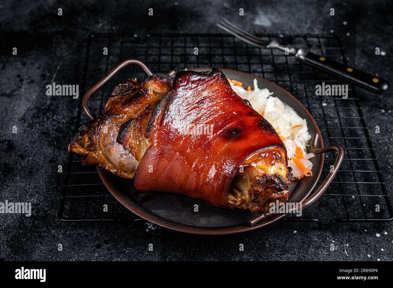 Traditional German cuisine Roasted pork knuckle Schweinshaxe with ...