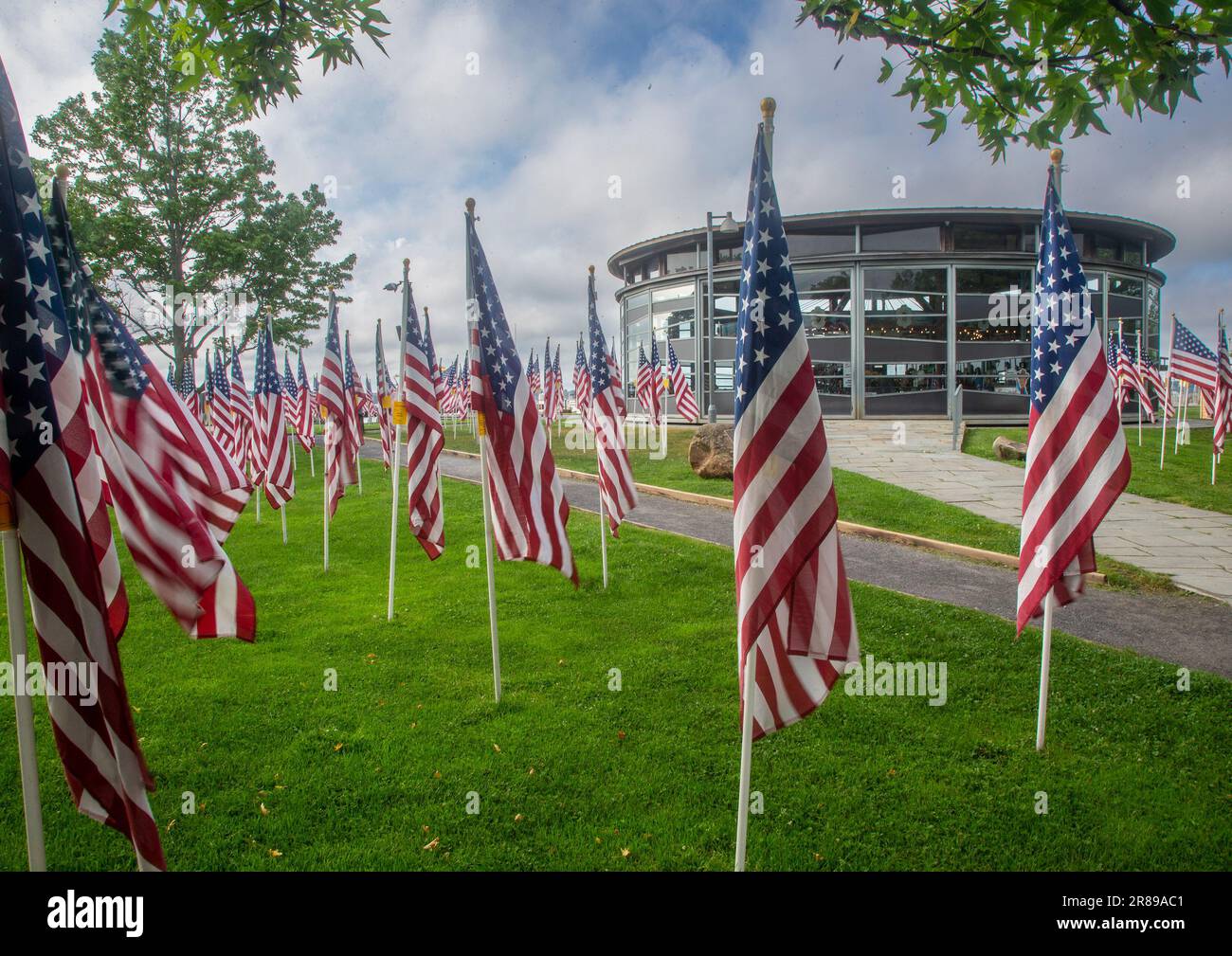 American flags on display in a park in the resort town of Greenport, NY