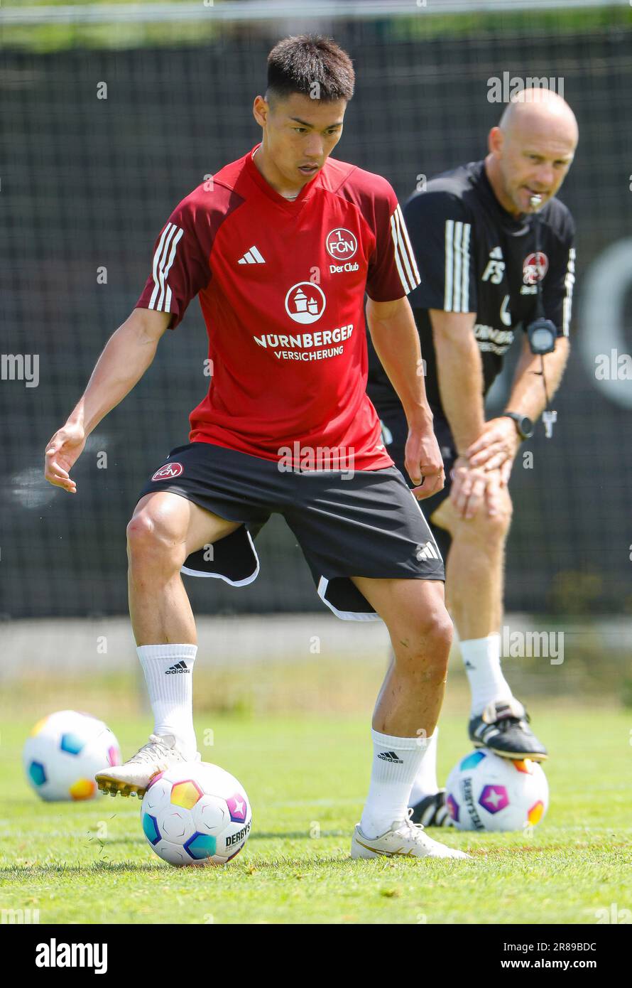 Nuremberg, Germany. 20th June, 2023. Soccer: 2nd Bundesliga, start of training for 1. FC Nürnberg, Sportpark Valznerweiher. Newcomer Daichi Hayashi (l) in action. Credit: Daniel Löb/dpa/Alamy Live News Stock Photo