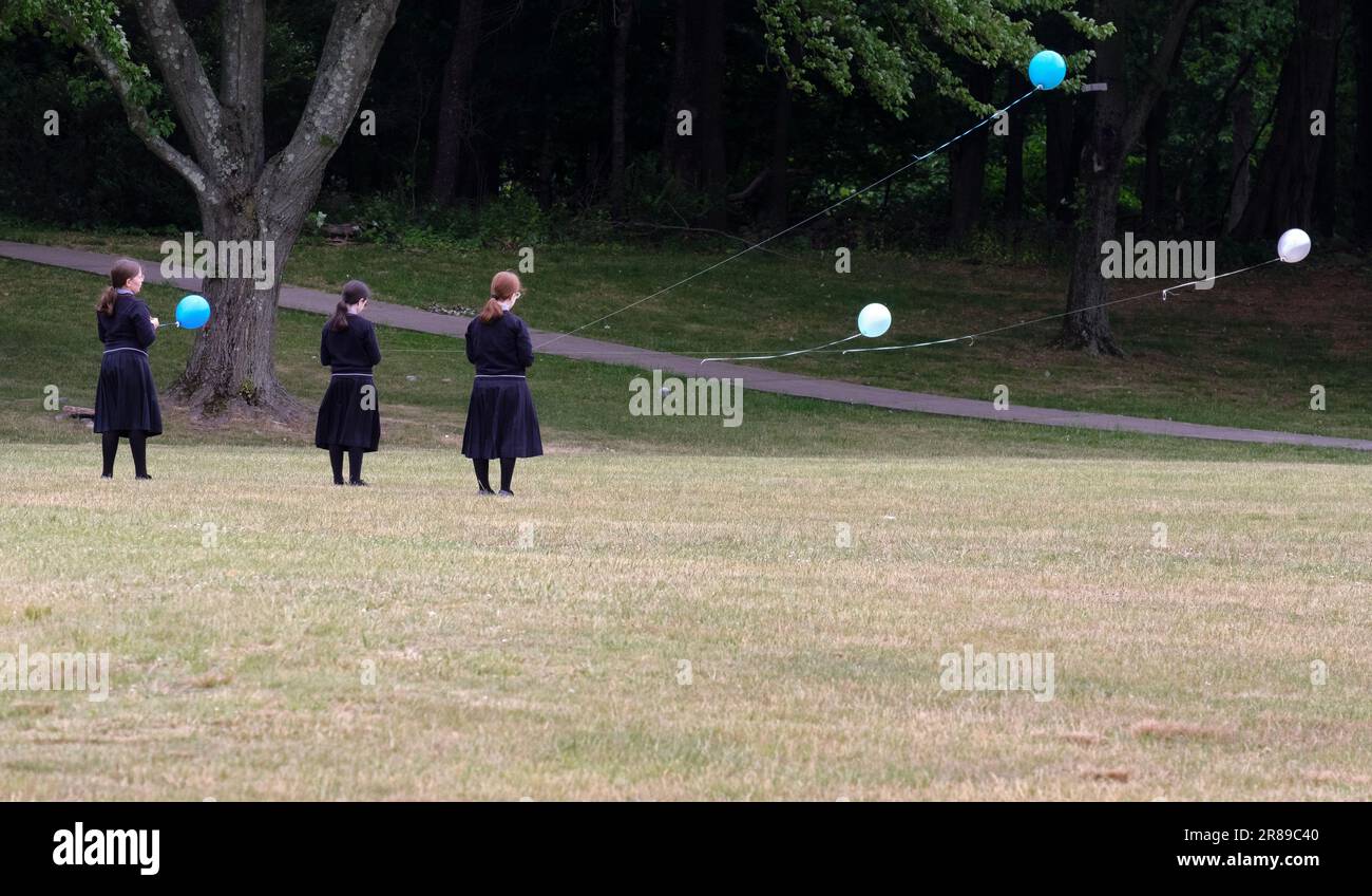 Orthodox Jewish girls celebrate the end of an academic year with a party in at Manny Weldler Park in Monsey, New York. Stock Photo
