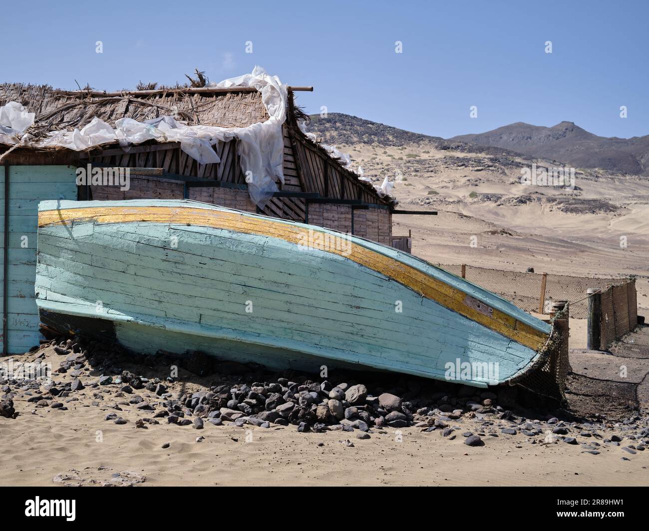 An upturned boat in the desert in Salamansa village, sao Vicente, Cabo verde Stock Photo