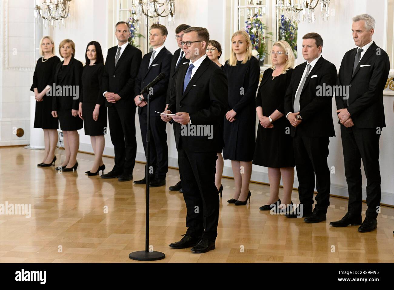 Finland's New Prime Minister Petteri Orpo, Center, Stands With Some Of ...