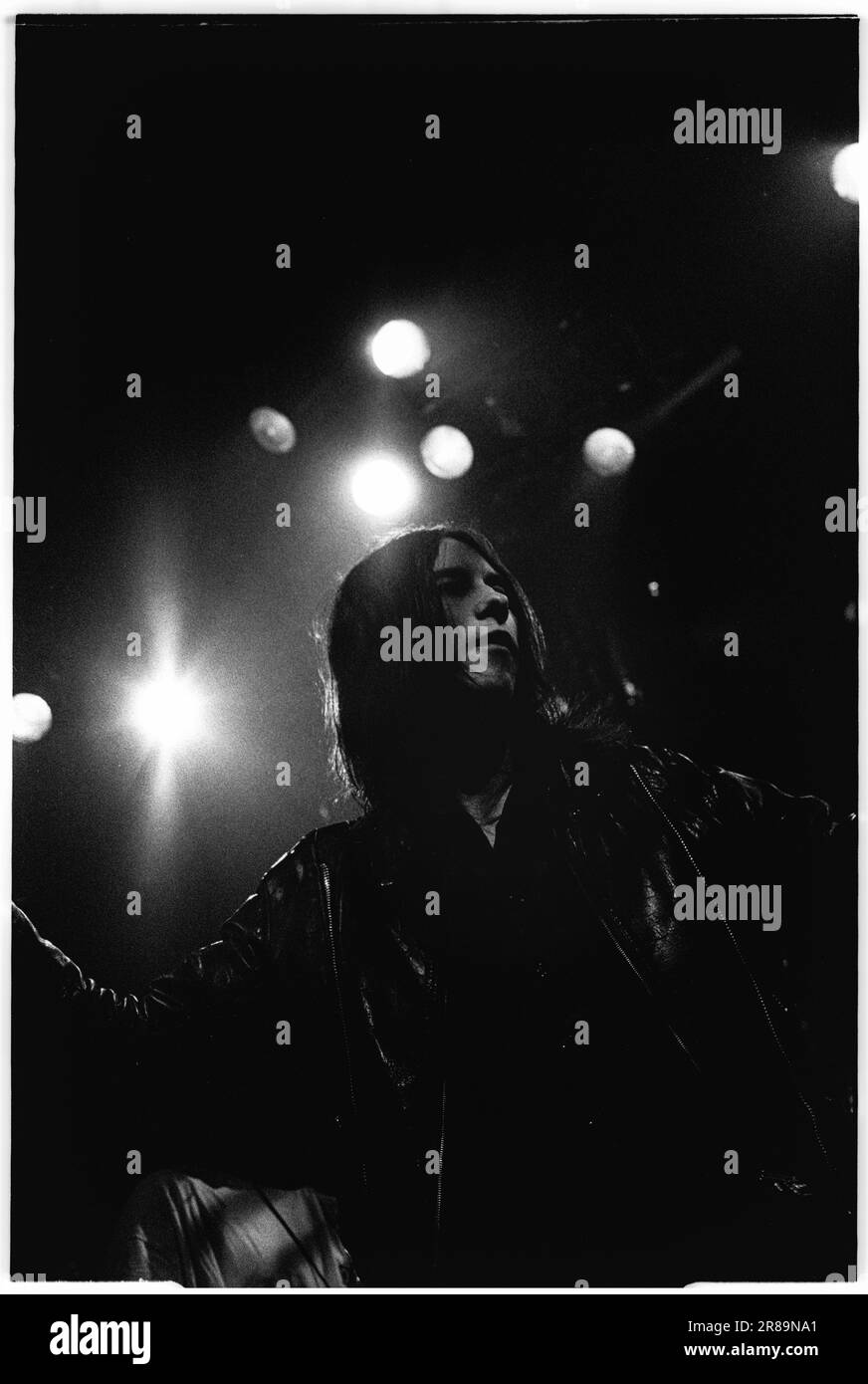 PRIMAL SCREAM, CONCERT, 1994: Bobby Gillespie of Scottish band Primal Scream playing live at the Great Hall, Cardiff University, Wales, UK on 7 April 1994. Photo: Rob Watkins. INFO: rimal Scream, a Scottish rock band, is known for their genre-defying approach. Albums like 'Screamadelica' fused rock with dance and won the Mercury Prize. Their diverse discography spans psychedelic, alternative, and electronic realms, reflecting their evolution and enduring influence. Stock Photo