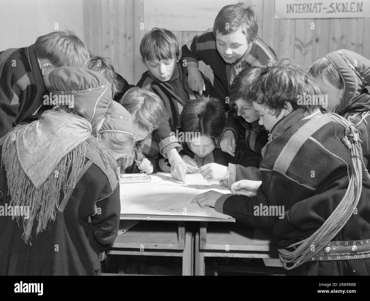 Current 3-1950: Natural children in straitjackets.Karasjok. School