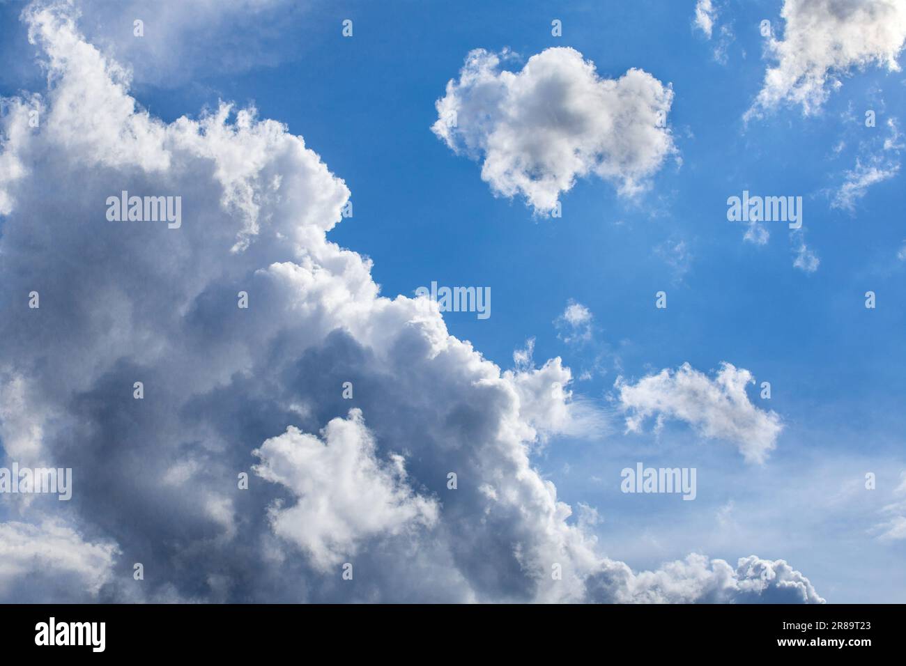 Cumulus storm clouds brewing on humid summer day - France. Stock Photo