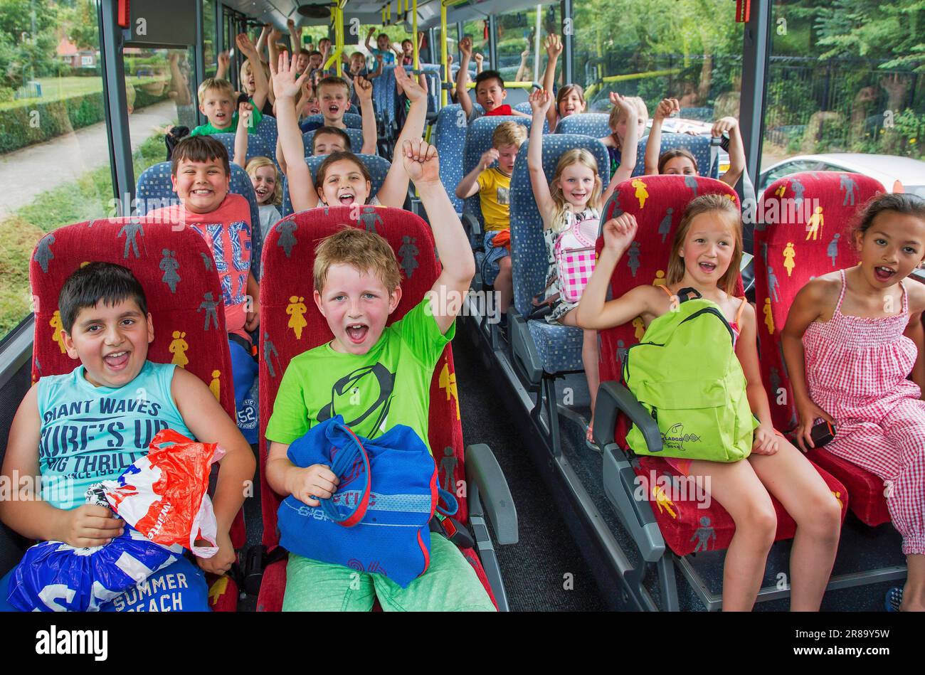Netherlands, children go out for a day with the school bus Stock Photo ...