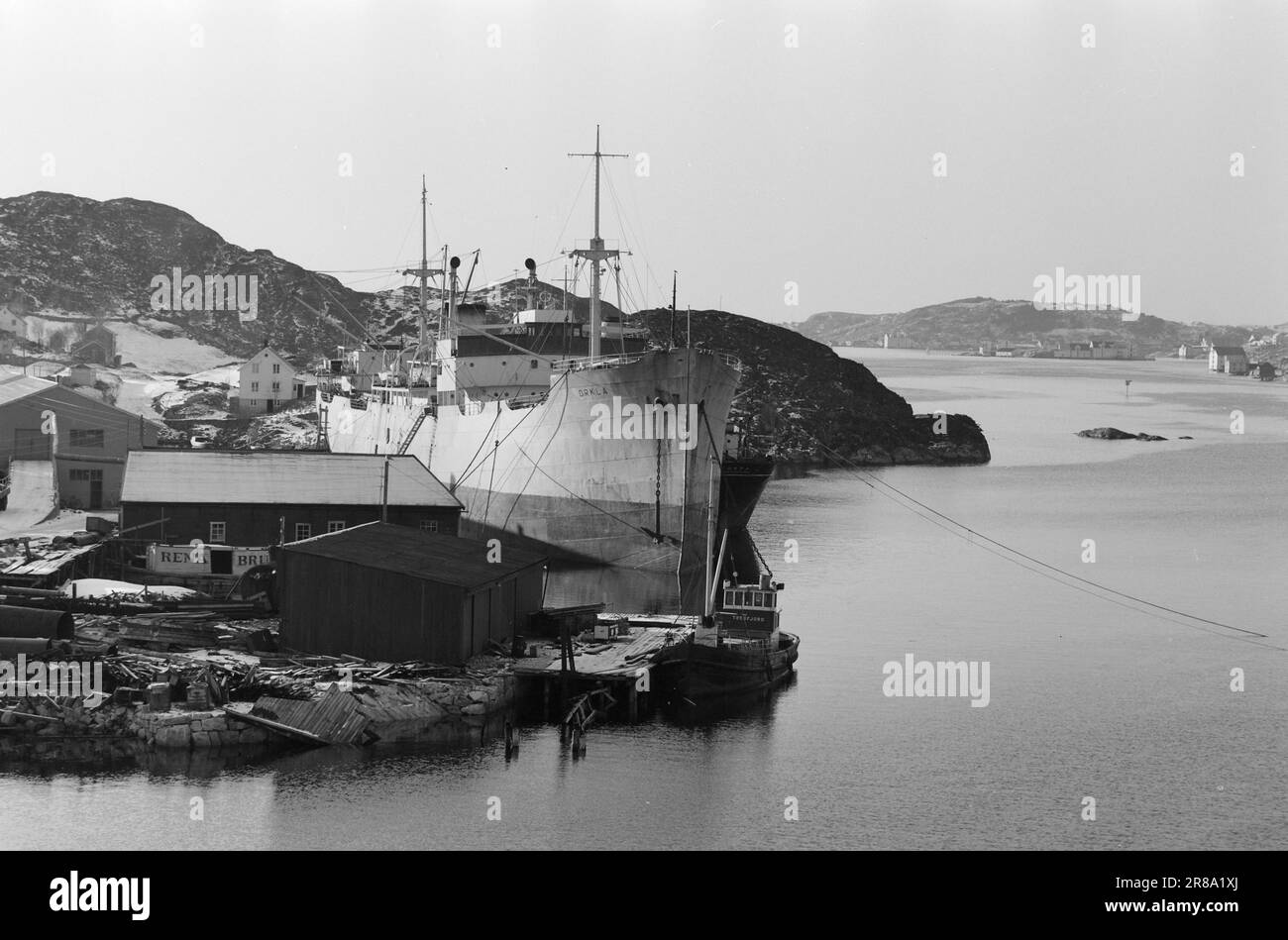 Current 10-9-1960: Floating coffin Flakke fixes old tubs in his own workshop that do not meet professional standards.  Half of Flakke's current fleet at the quay at Flakke's workshop in Rena outside Kristiansund, the new (but 25-year-old) 'Orkla' of approx. 7,000 tonnes and 'Torpa' of 2,500 tonnes d.w. 'Kovda' has been seized by Swedish ship control. 'Knoll' is the only vessel Flakke's shipping company has in operation.  Photo: Sverre A. Børretzen / Aktuell / NTB ***PHOTO NOT IMAGE PROCESSED*** Stock Photo