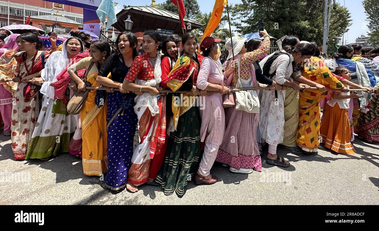 Kathmandu, Bagmati, Nepal. 20th June, 2023. Women participate in the Jagannath Rath Yatra, an annual chariot festival, organised by ISKCON Nepal in Kathmandu, Nepal on June 20, 2023. The festival is celebrated all over the world as that involves moving deities Jagannath, Balabhadra, Subhadra and Sudarshana on a ratha or rotho, a wooden deula-shaped chariot. (Credit Image: © Sunil Sharma/ZUMA Press Wire) EDITORIAL USAGE ONLY! Not for Commercial USAGE! Stock Photo