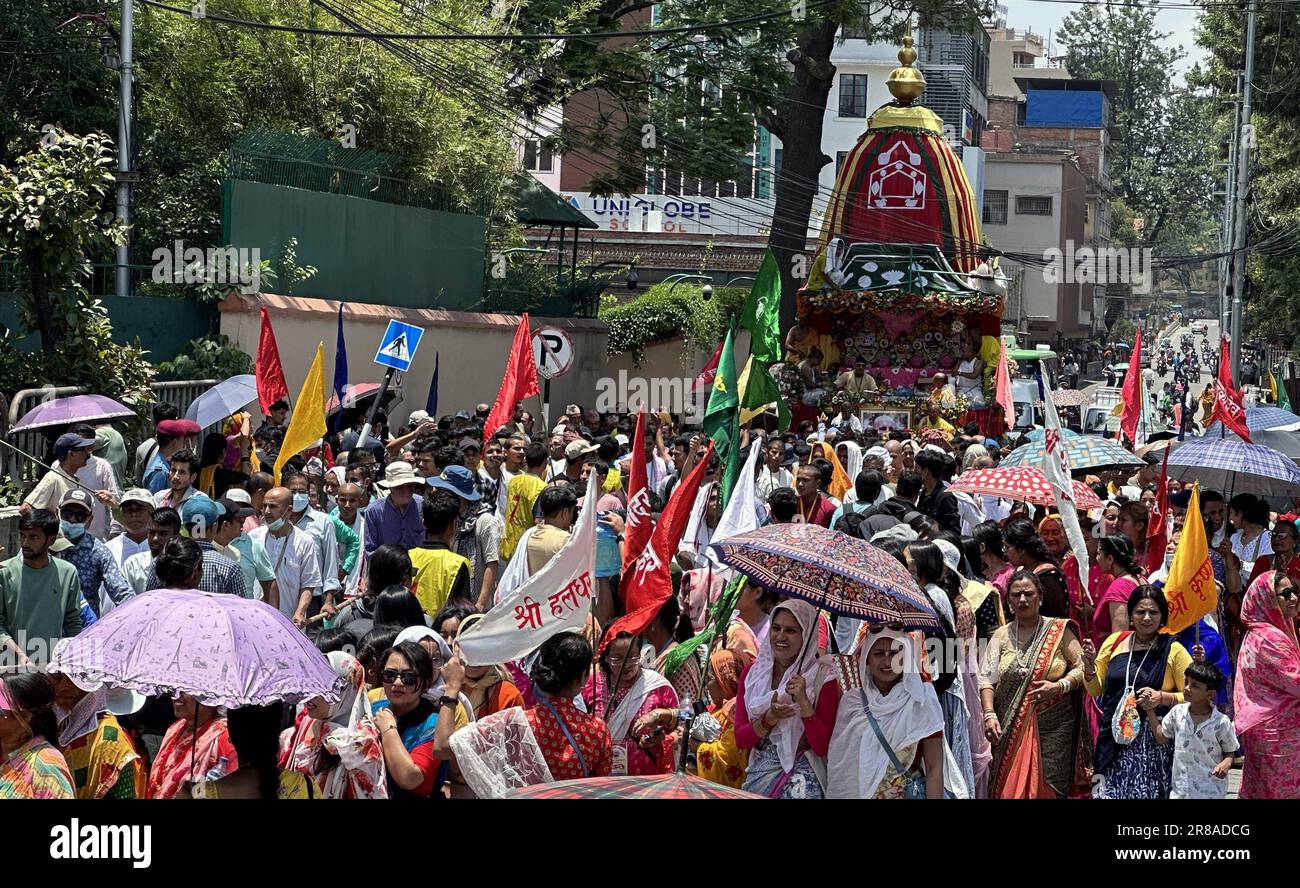 Kathmandu, Bagmati, Nepal. 20th June, 2023. People participate in the Jagannath Rath Yatra, an annual chariot festival, organised by ISKCON Nepal in Kathmandu, Nepal on June 20, 2023. The festival is celebrated all over the world as that involves moving deities Jagannath, Balabhadra, Subhadra and Sudarshana on a ratha or rotho, a wooden deula-shaped chariot. (Credit Image: © Sunil Sharma/ZUMA Press Wire) EDITORIAL USAGE ONLY! Not for Commercial USAGE! Stock Photo