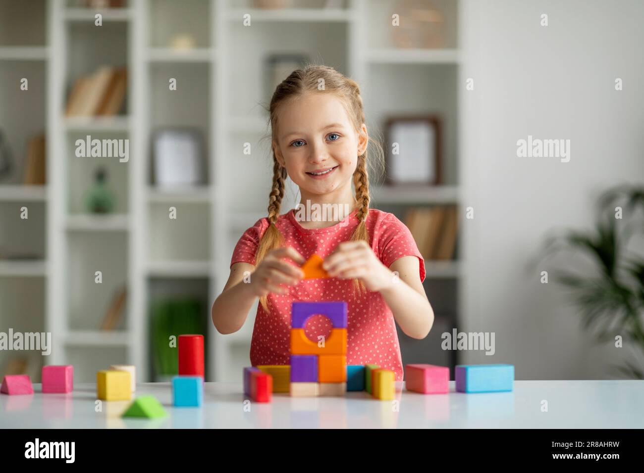 Development Activities. Cute Happy Little Girl Playing With Colorful ...