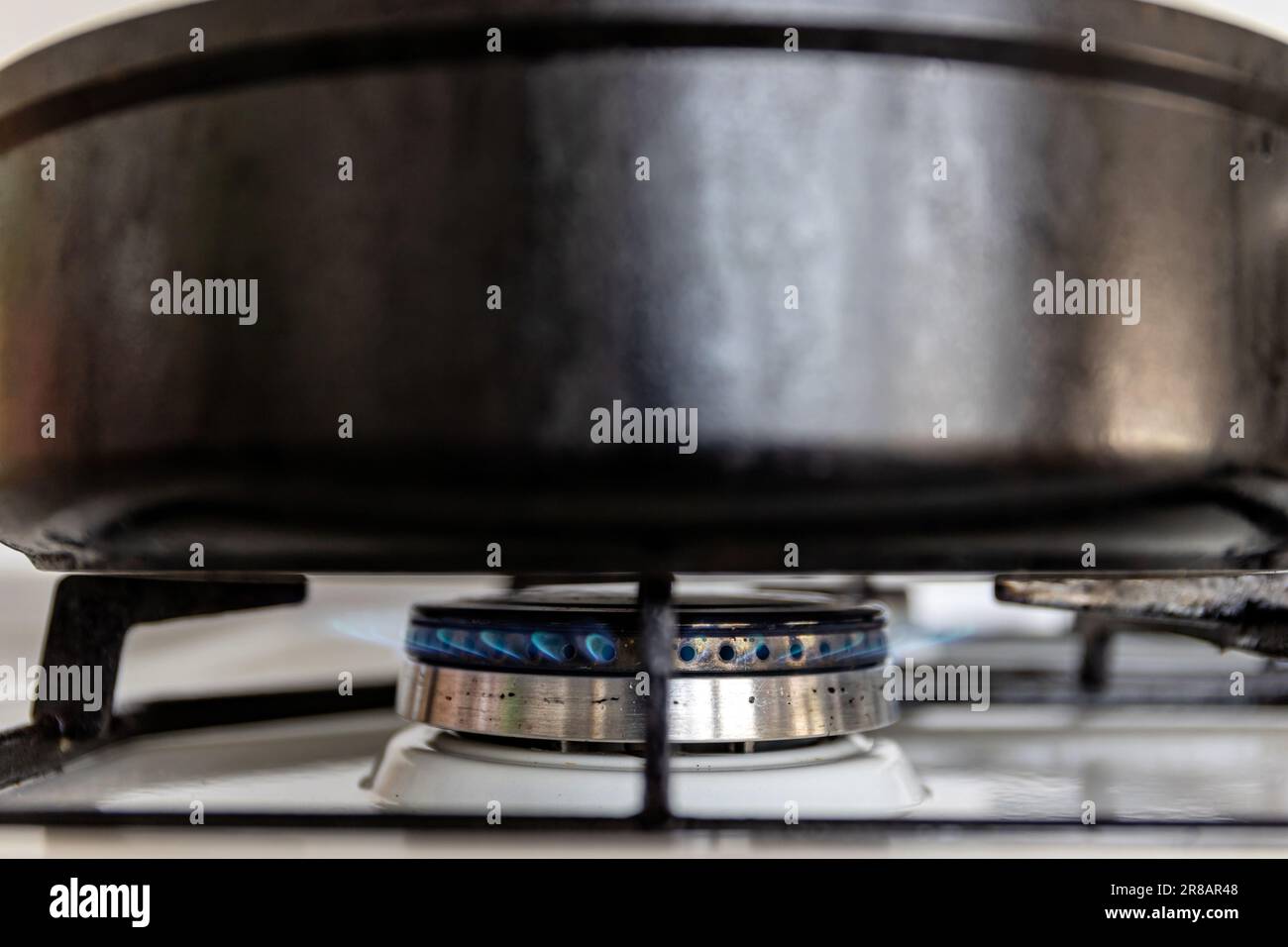 nonstick coated pan on gas stove Stock Photo Alamy