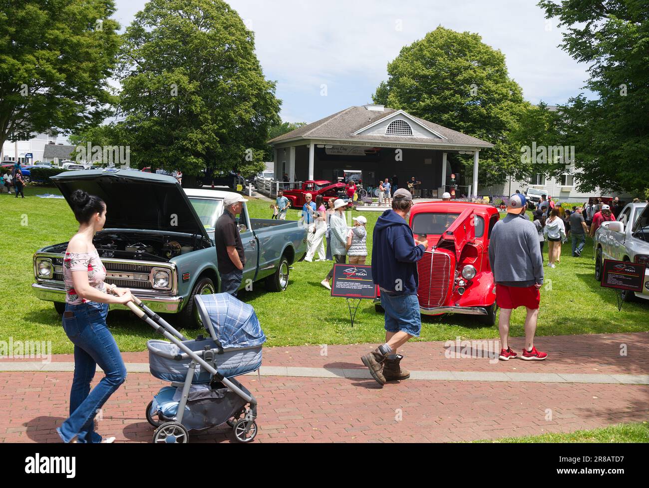 Father's Day Auto Show - Hyannis, Massachusetts, Cape Cod - USA.  People pass by automobiles on display Stock Photo