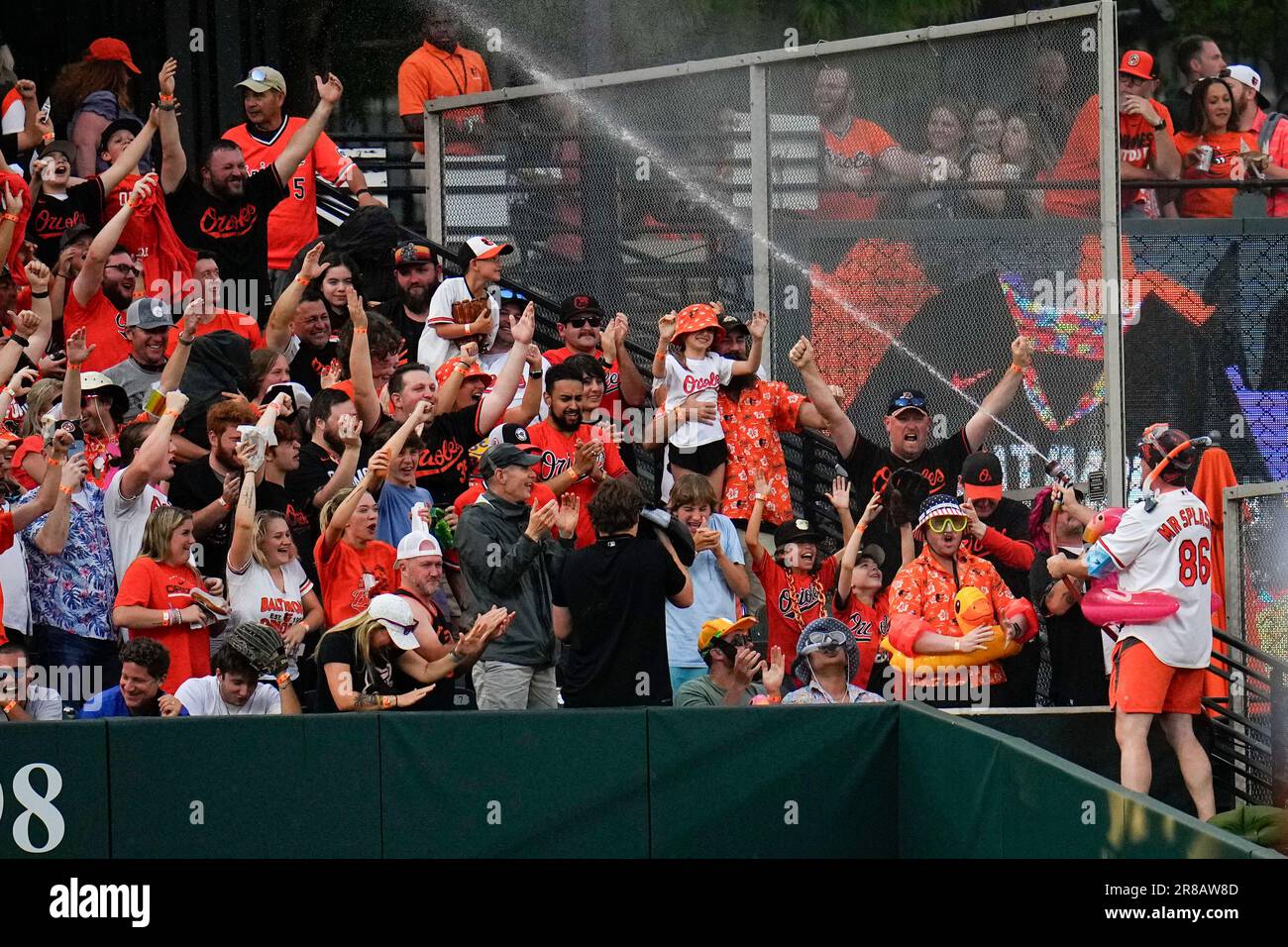 Mr. Splash, bottom right, douses fans in the Bird Bath Splash Zone