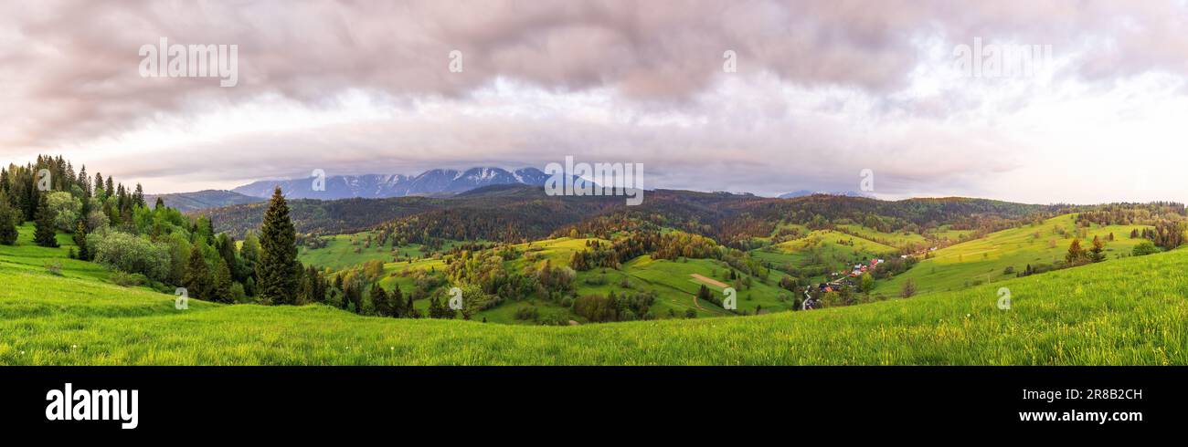 Osturna village in Slovakia with Belianske Tatras on background. Stock Photo