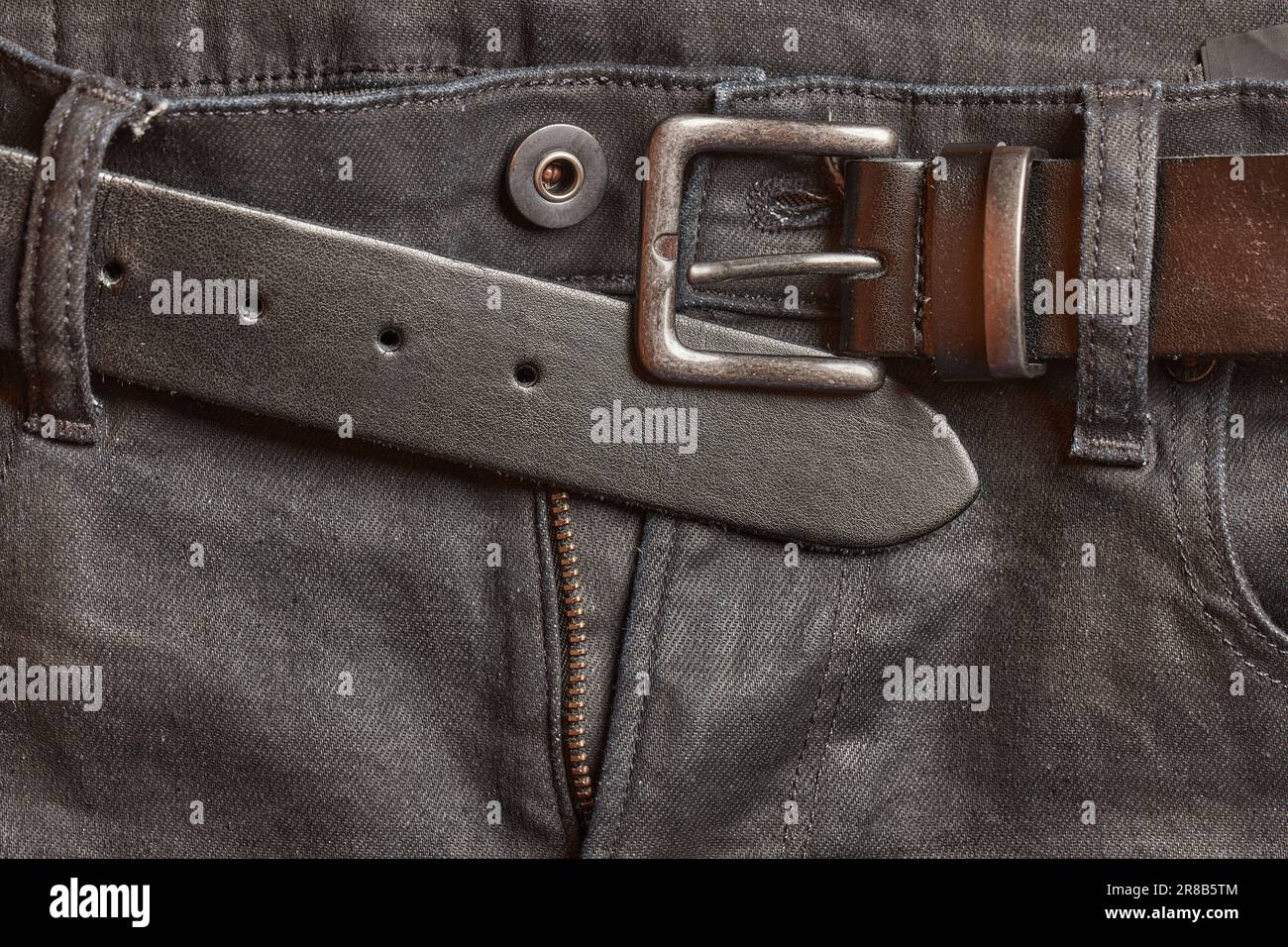 Black jeans leather belt Stock Photo Alamy