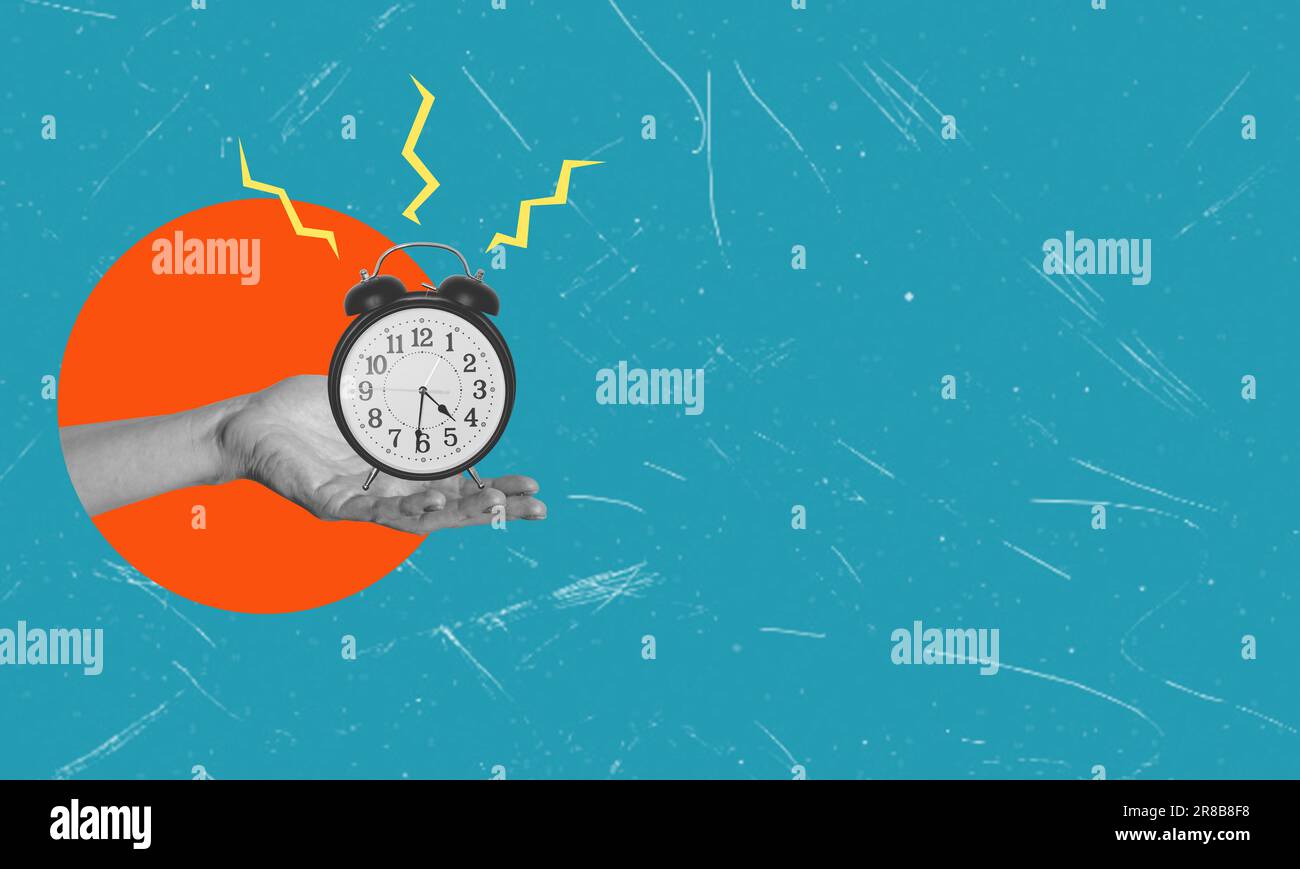 Human hand-holding alarm clock on a blue background, concept idea. Art ...