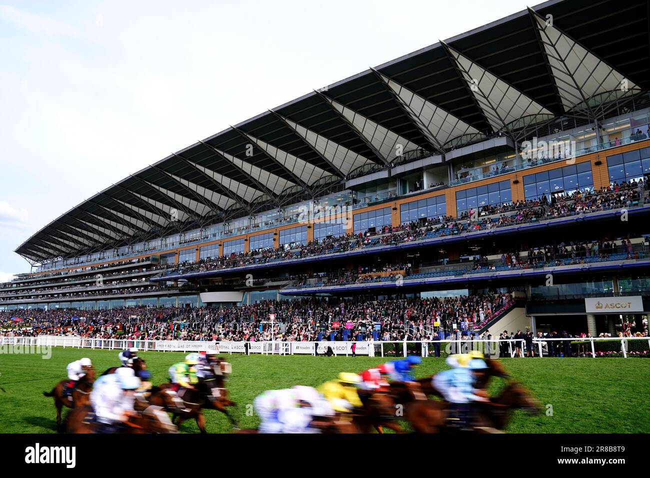 Runners and riders in action as they compete in the Copper Horse Handicap during day one of