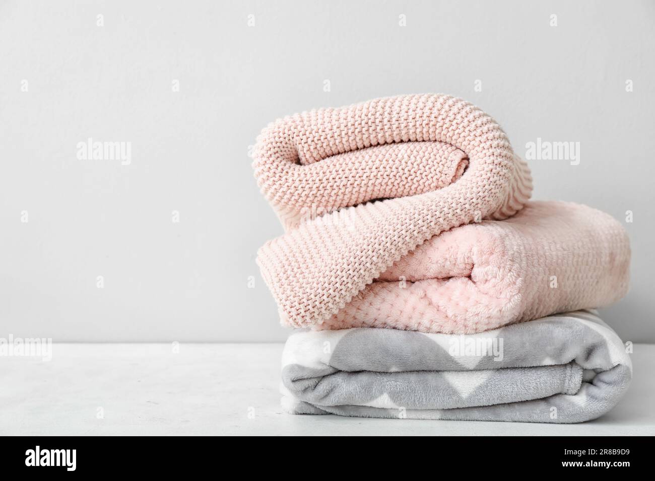 New soft folded blankets hi-res stock photography and images - Alamy