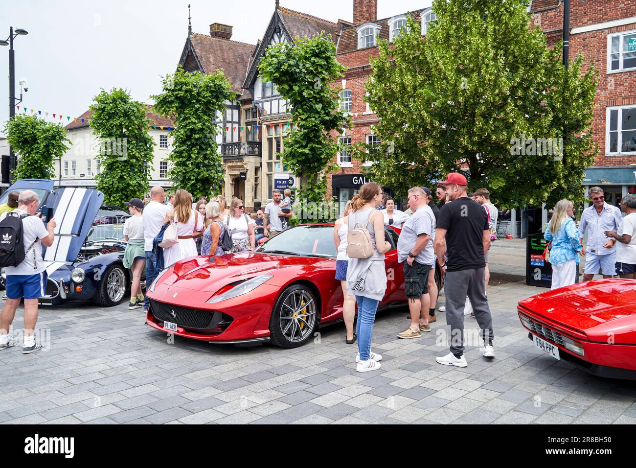 Crowd of people looking at classic cars at a car show in Salisbury UK