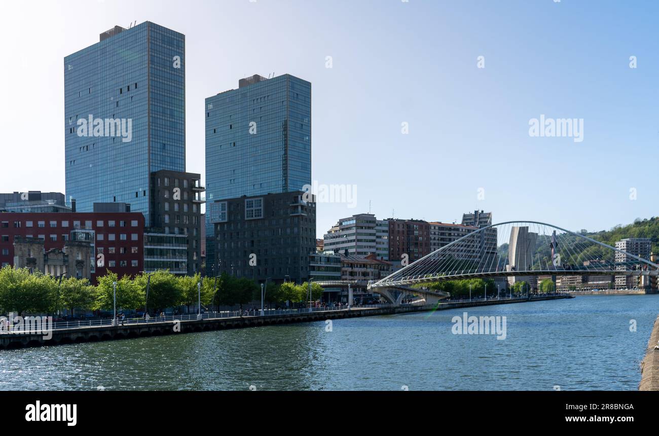 Contrast of old and modern buildings next to the estuary in Bilbao ...