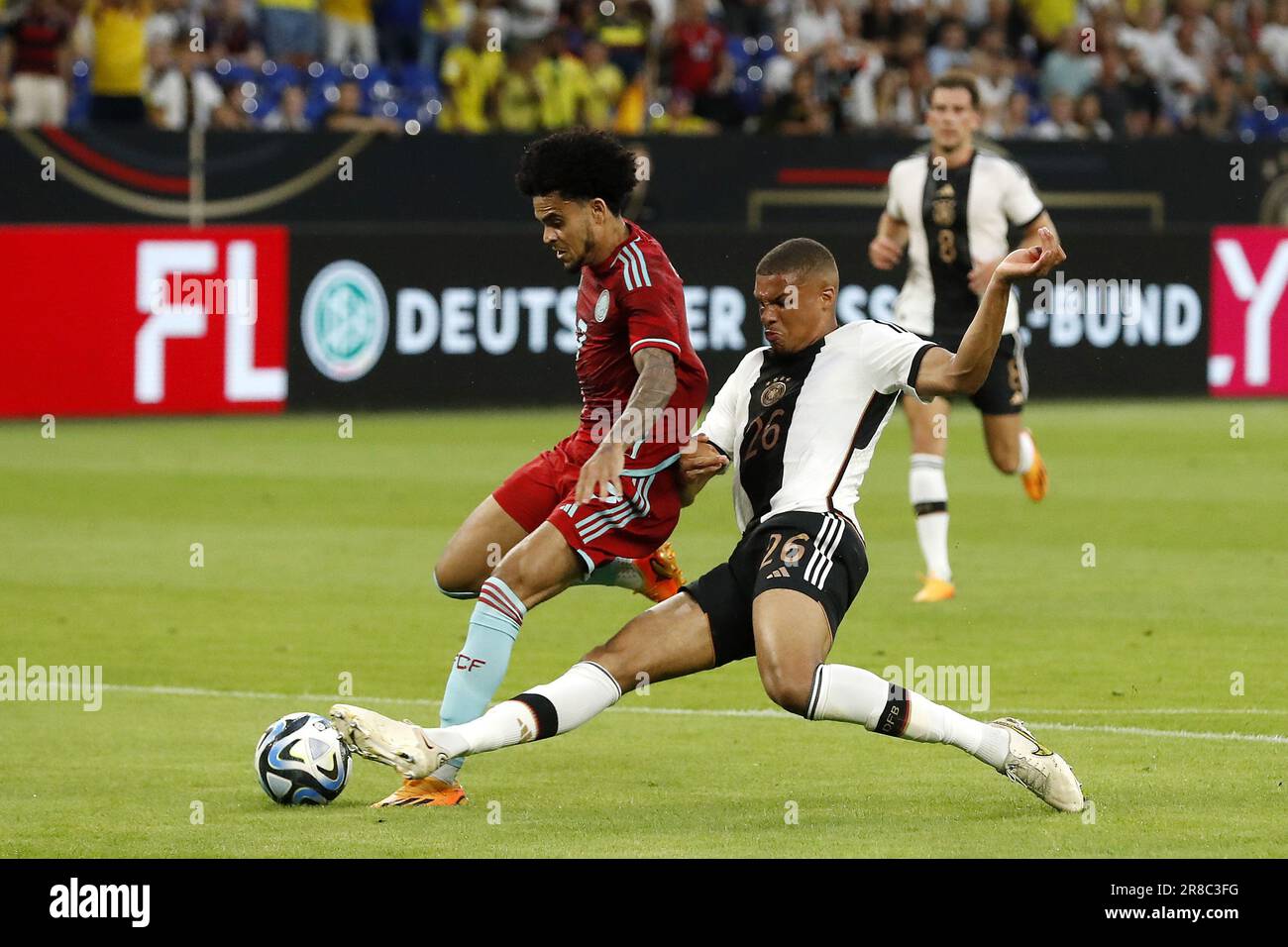 GELSENKIRCHEN - 20/06/2023, (LR) Luis Diaz of Colombia, Felix Nmecha of Germany during the Friendly Interland match between Germany and Colombia at the Veltins-Arena on June 20, 2023 in Gelsenkirchen, Germany. AP | Dutch Height | BART STOUTJESDYK Stock Photo